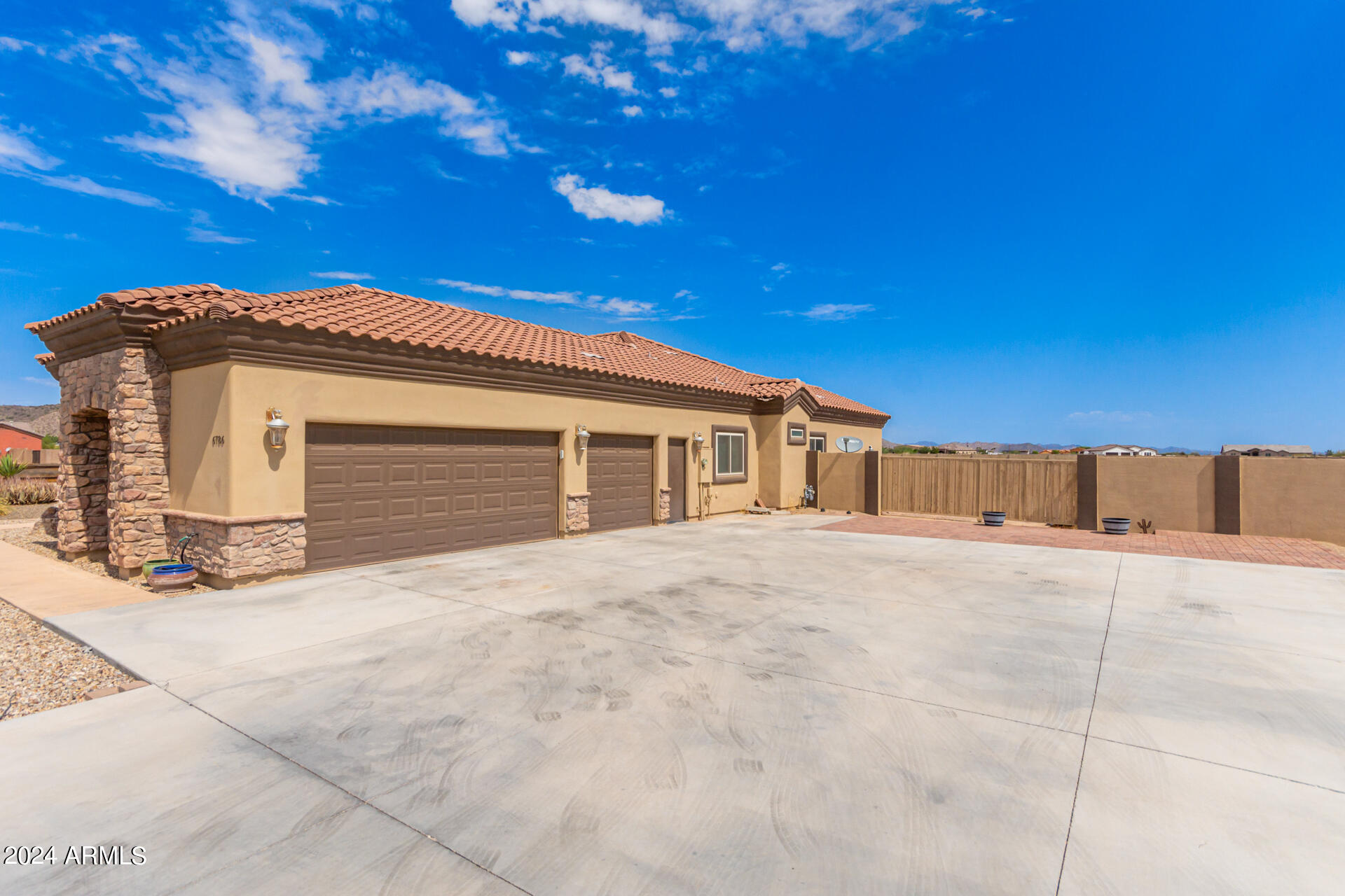 6786 Gelding Lane Coolidge, AZ 85128 - Photo 38 of 39 a view of an house with backyard space