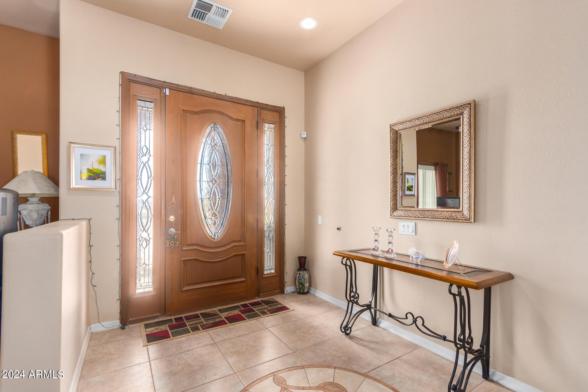 6786 Gelding Lane Coolidge, AZ 85128 - Photo 9 of 39 a view of a livingroom with furniture and mirror