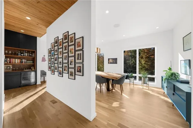 a view of a house with sitting area and garden