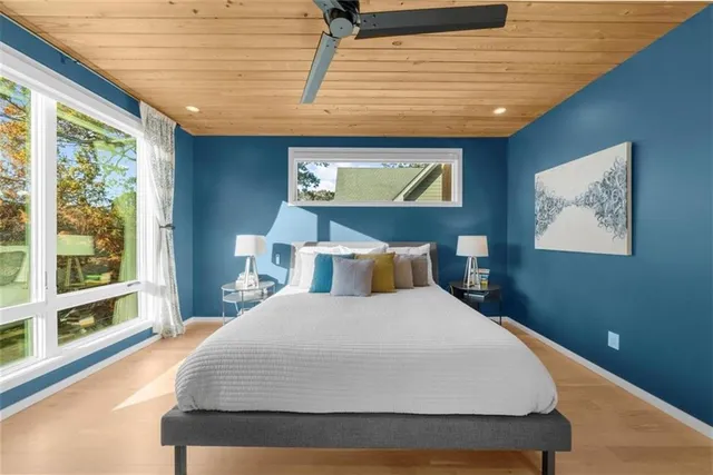 a view of a living room and a balcony