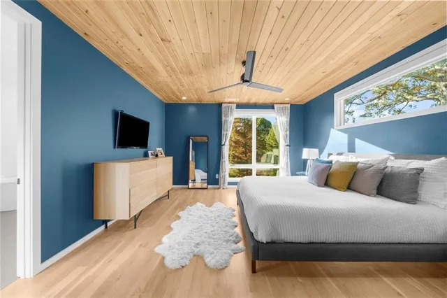 a view of a patio with a dining table and chairs