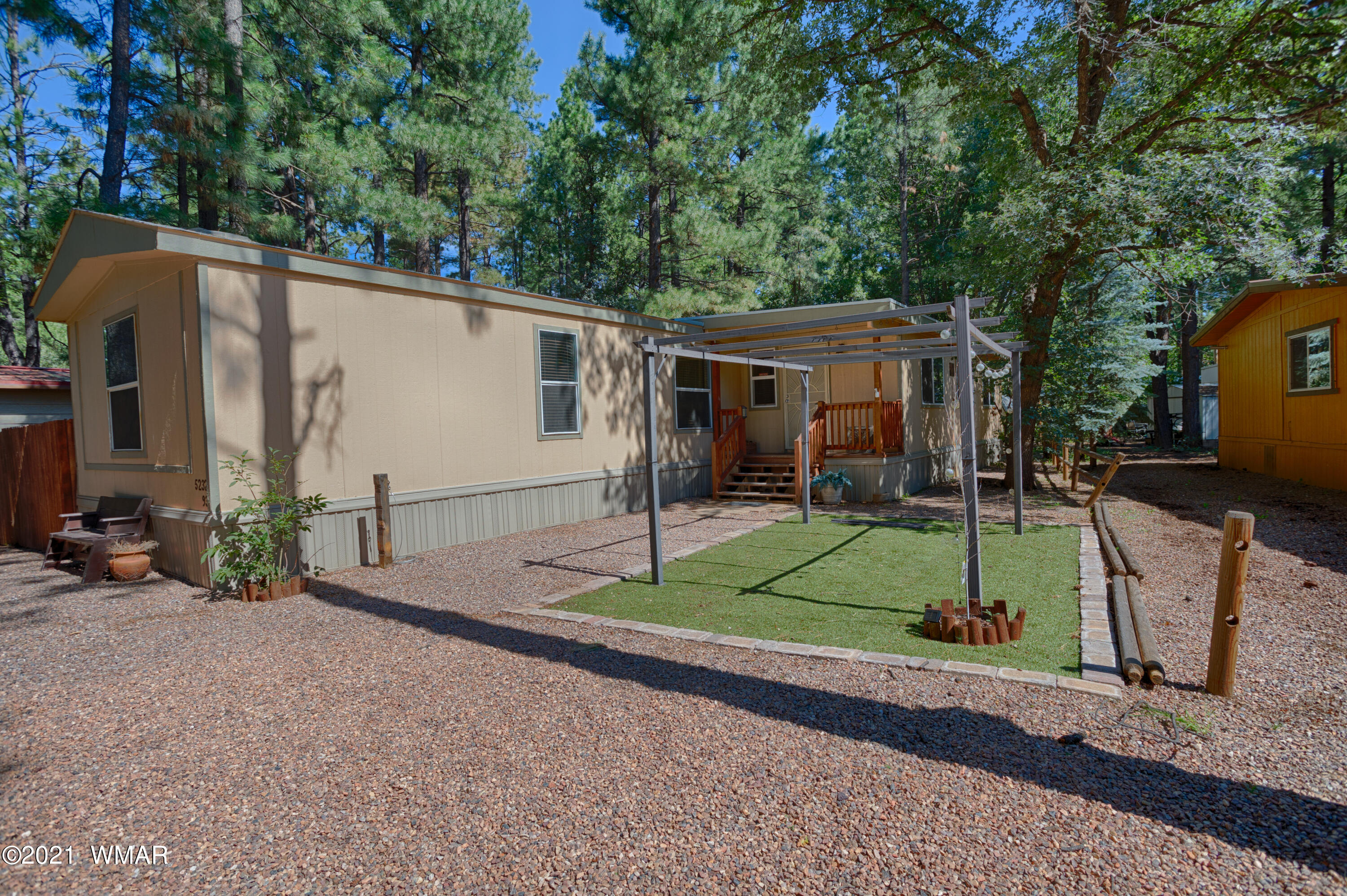5232 South Blue Ridge Loop Pinetop, AZ 85935 - Photo 1 of 18 a view of backyard with small cabin
