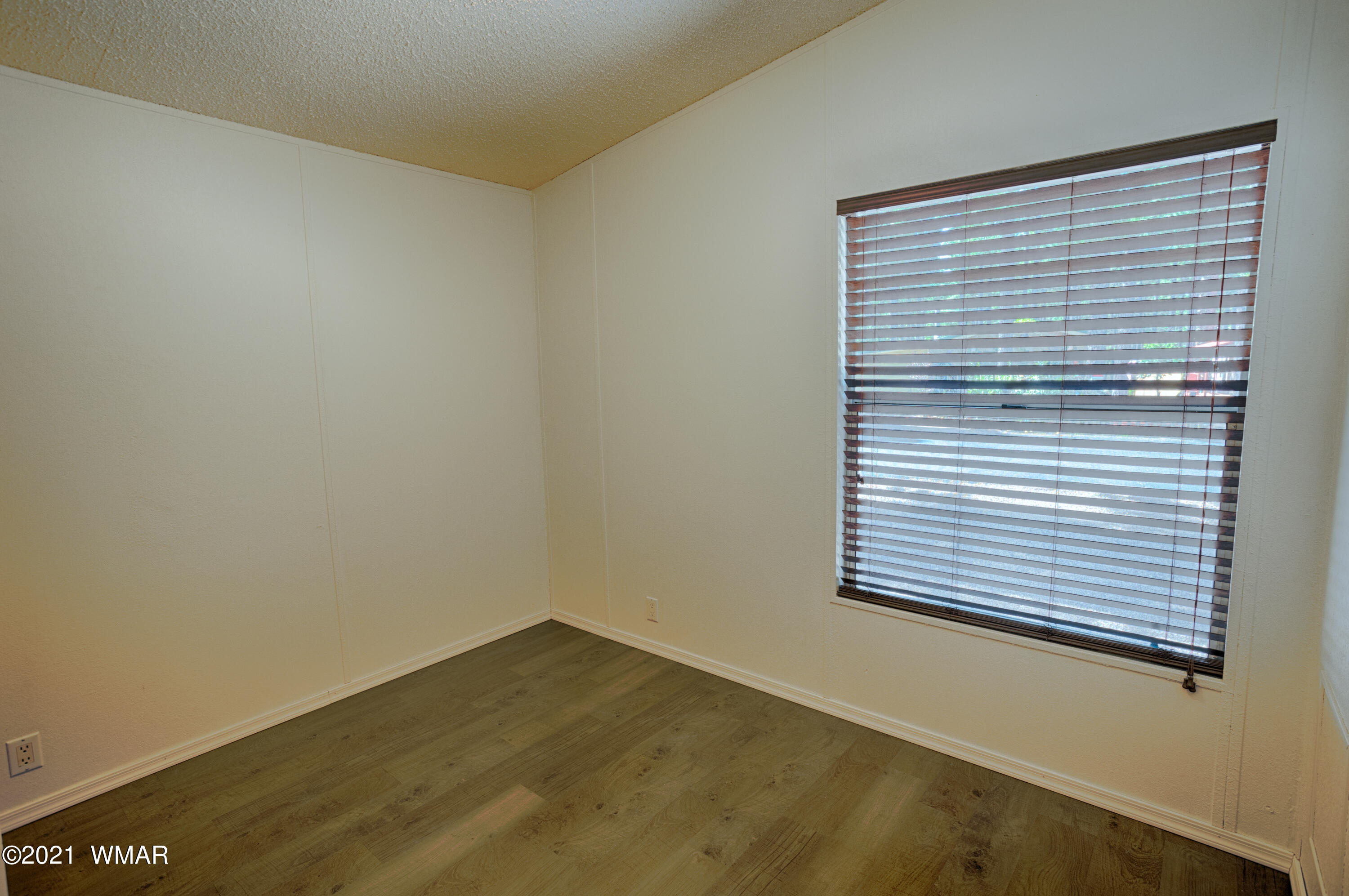 5232 South Blue Ridge Loop Pinetop, AZ 85935 - Photo 16 of 18 a view of a room that has a window in it