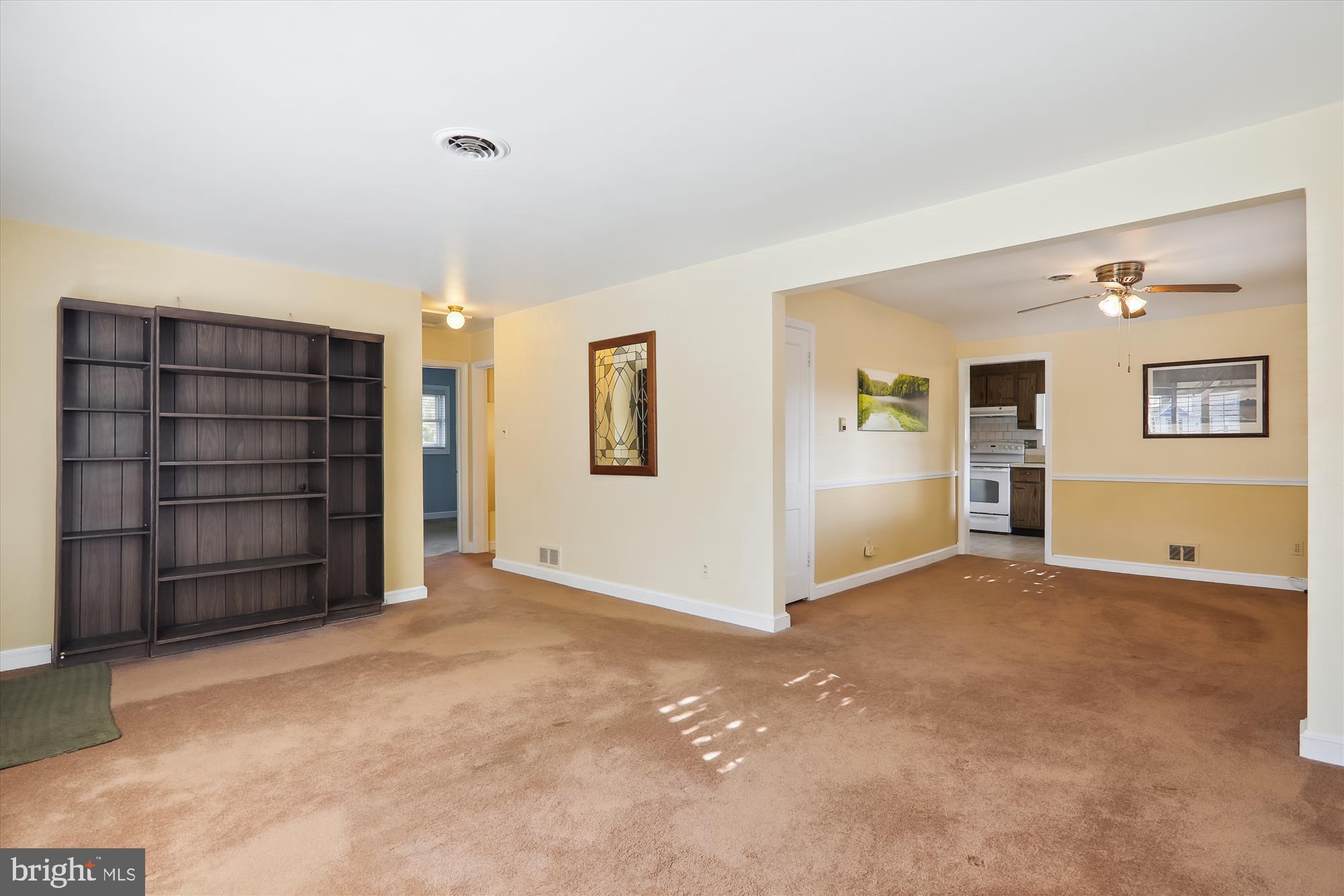 2205 Prichard Road Silver Spring, MD 20902 - Photo 6 of 37 Living Room Opens to the Dining Room