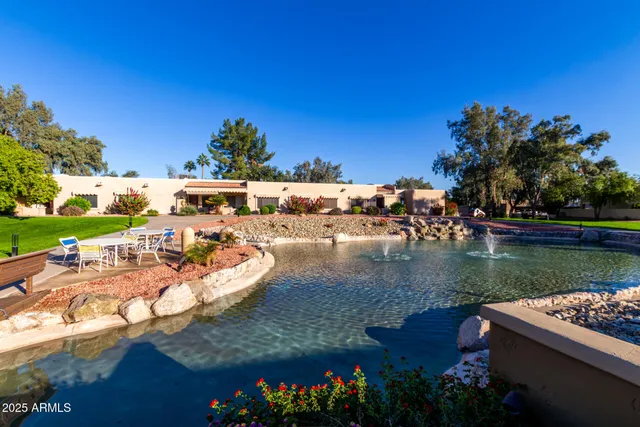 a view of an house with a big yard