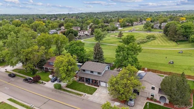 an aerial view of a house with a garden