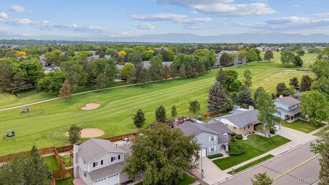 an aerial view of a house with a garden