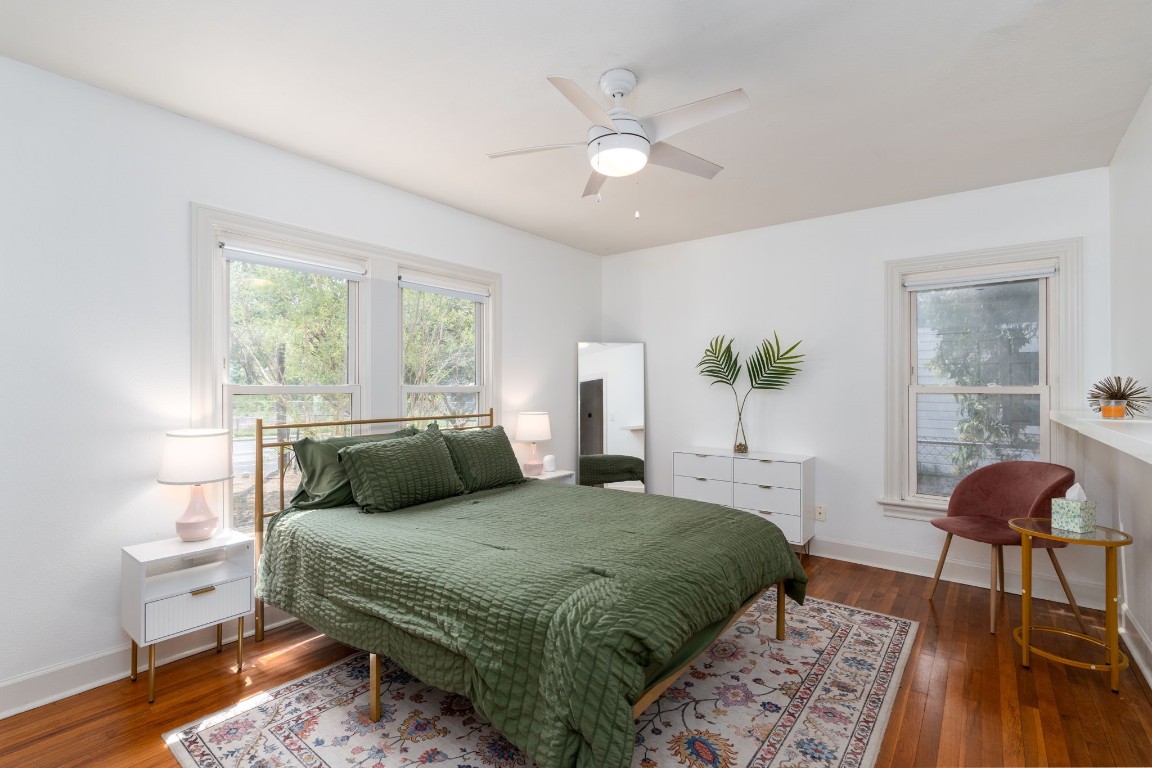 746 Springdale Road Austin, TX 78702 - Photo 3 of 19 a bedroom with a bed and window