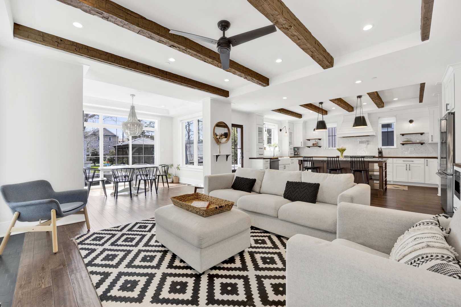 317 Lionel Road Riverside, IL 60546 - Photo 11 of 47 a living room with furniture kitchen view and a large window