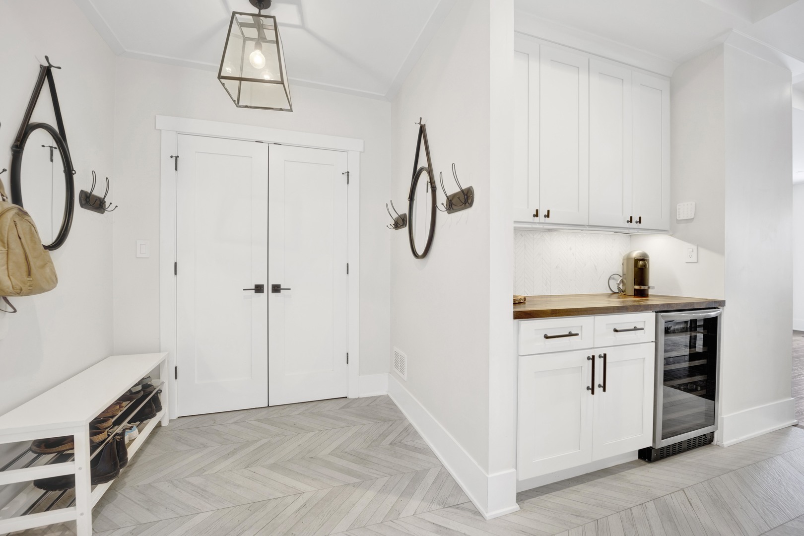 317 Lionel Road Riverside, IL 60546 - Photo 16 of 47 a kitchen with white cabinets and white appliances