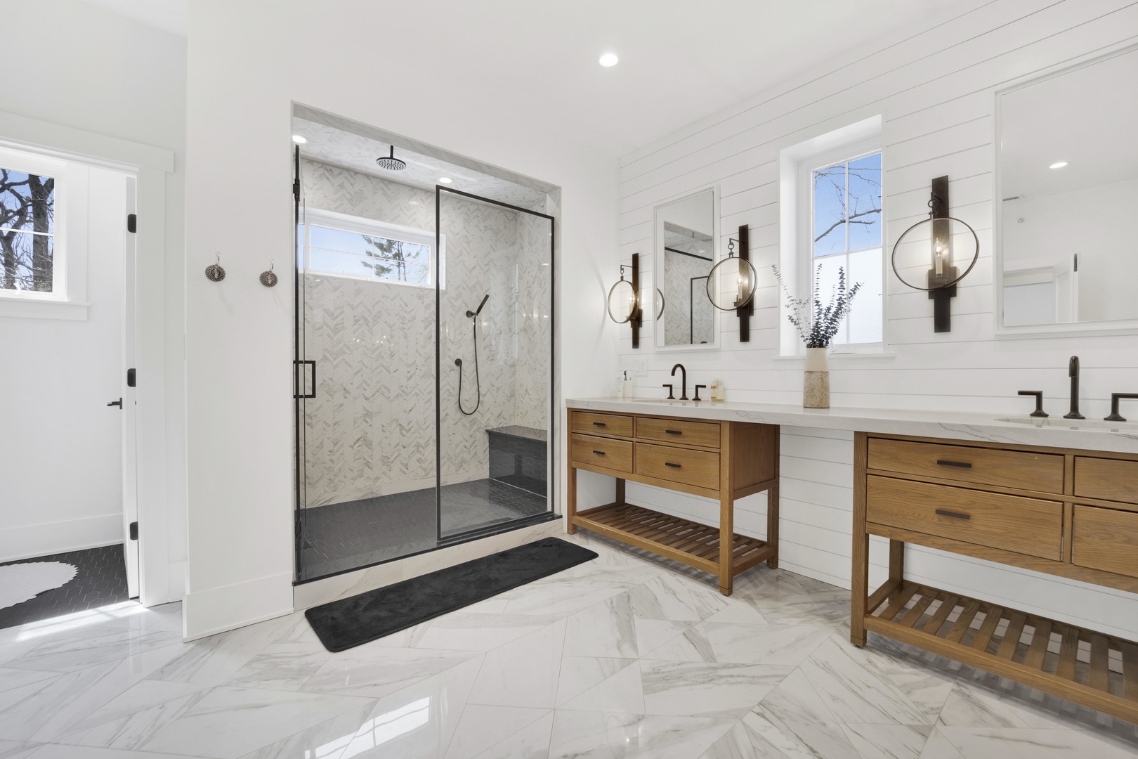 317 Lionel Road Riverside, IL 60546 - Photo 21 of 47 a spacious bathroom with a mirror sink and double vanity