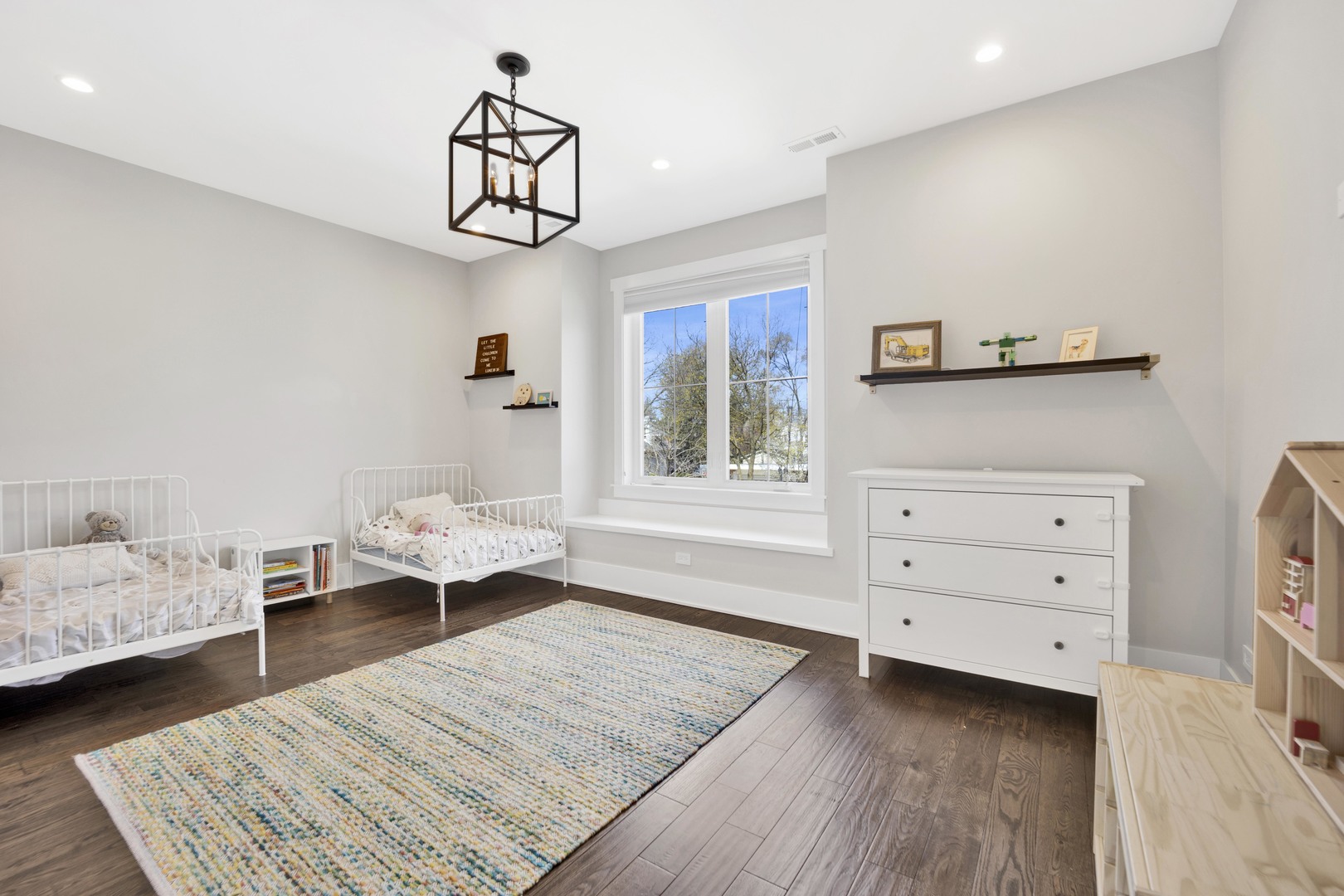 317 Lionel Road Riverside, IL 60546 - Photo 23 of 47 a bedroom with a bed and a dresser