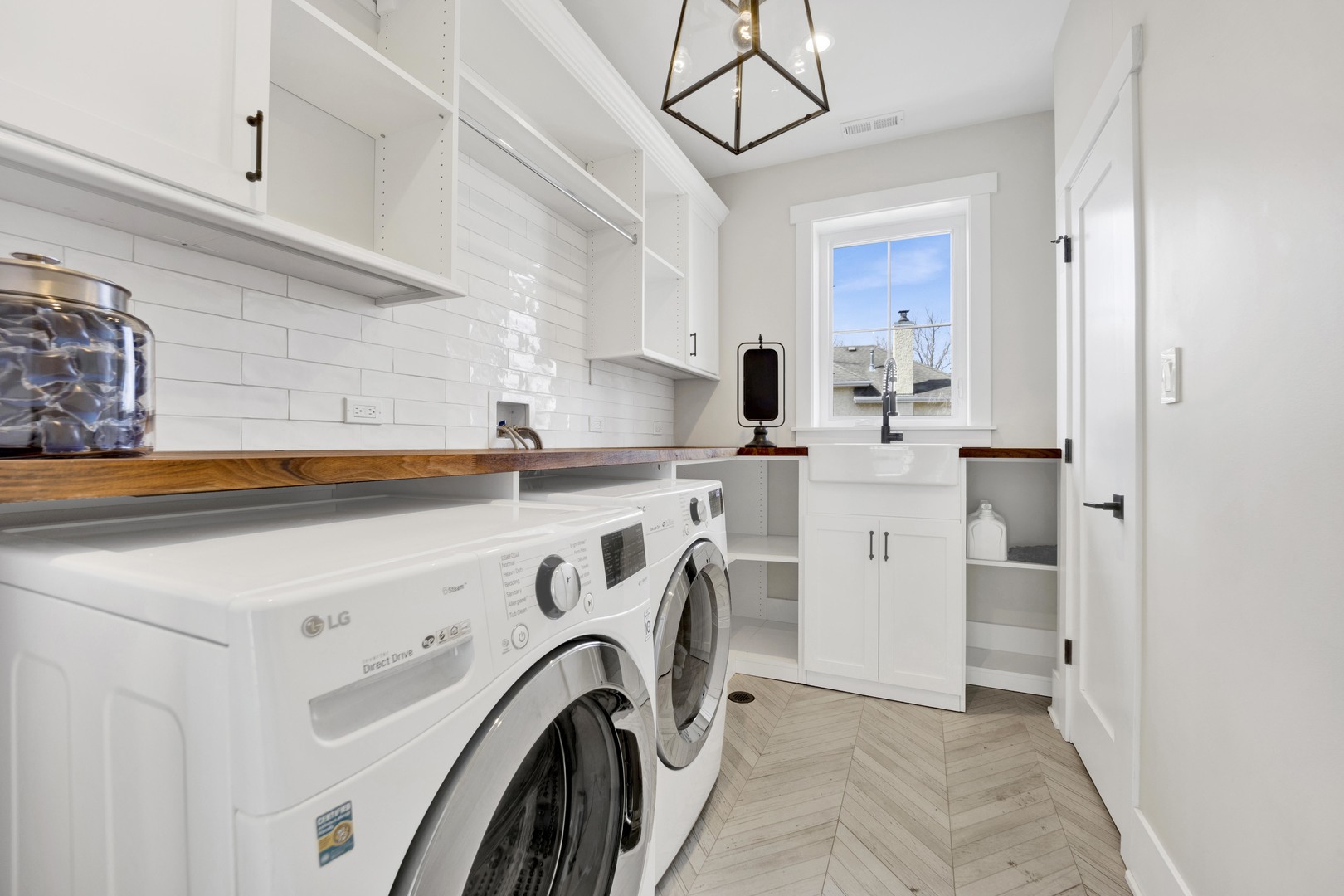 317 Lionel Road Riverside, IL 60546 - Photo 26 of 47 a view of a kitchen with washer and dryer