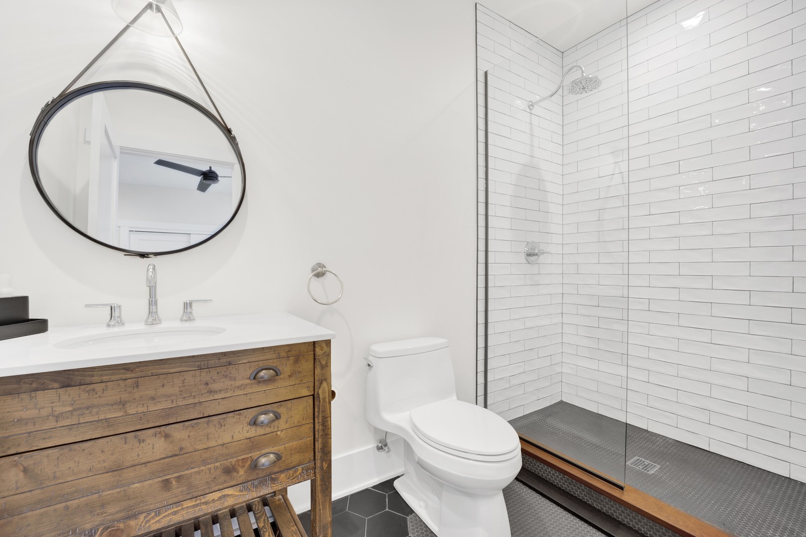 317 Lionel Road Riverside, IL 60546 - Photo 31 of 47 a bathroom with a sink a toilet and a mirror