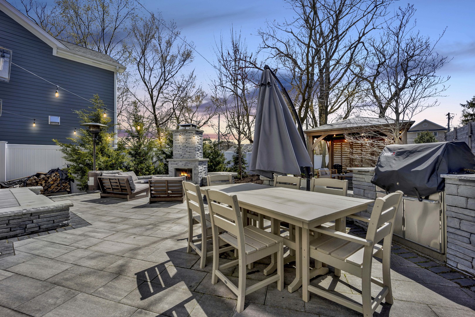 317 Lionel Road Riverside, IL 60546 - Photo 36 of 47 a view of a dinning table and chairs in the patio