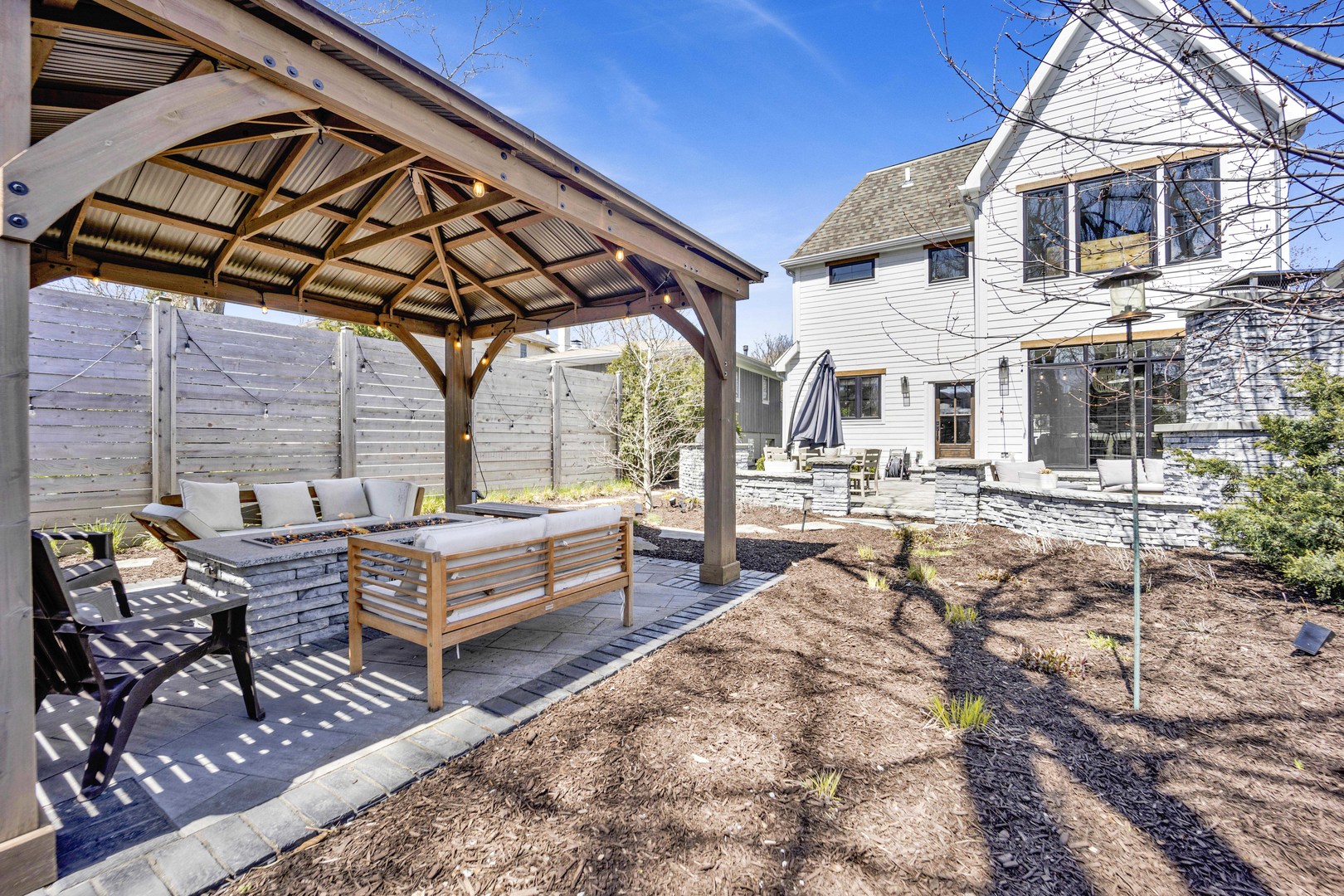 317 Lionel Road Riverside, IL 60546 - Photo 39 of 47 a view of a chairs and table in the patio