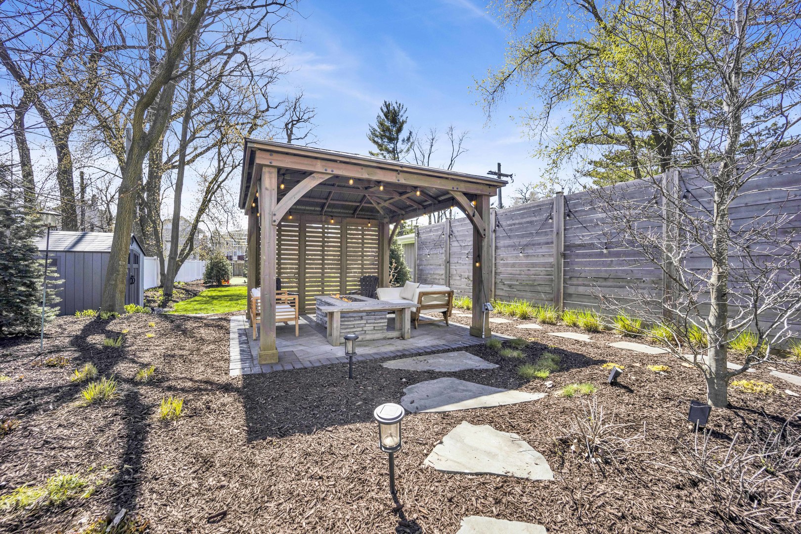 317 Lionel Road Riverside, IL 60546 - Photo 40 of 47 a view of a house with backyard and sitting area