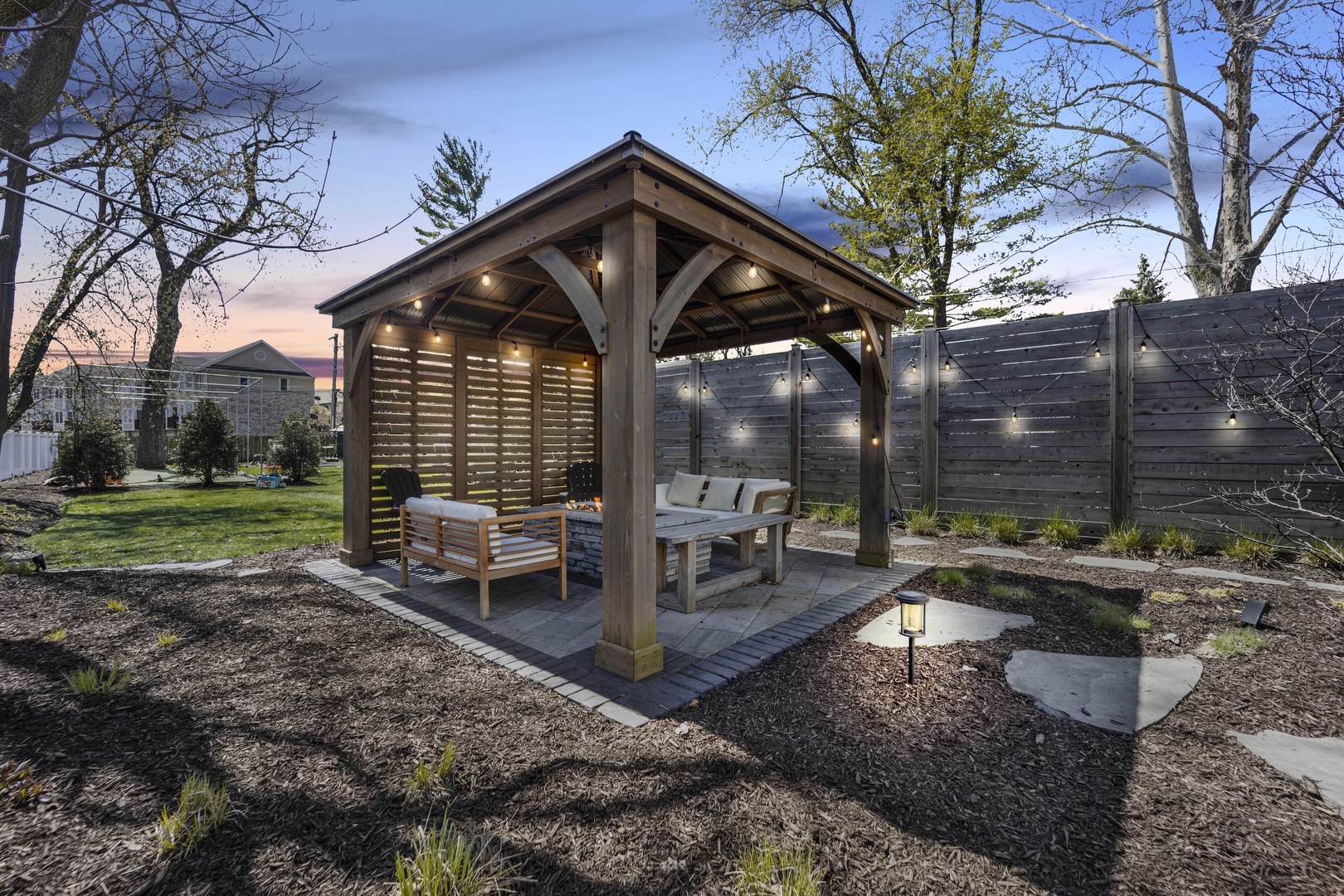 317 Lionel Road Riverside, IL 60546 - Photo 42 of 47 a view of a house with backyard and sitting area