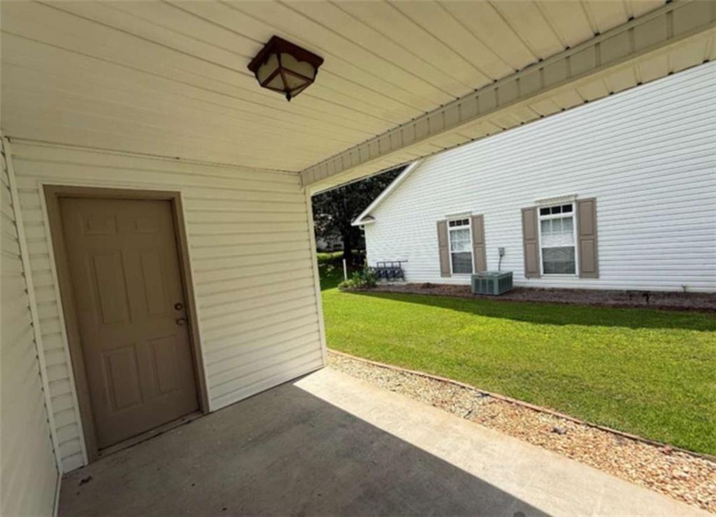 153 Crest Pointe Bremen, GA 30110 - Photo 20 of 24 a front view of a house with a yard