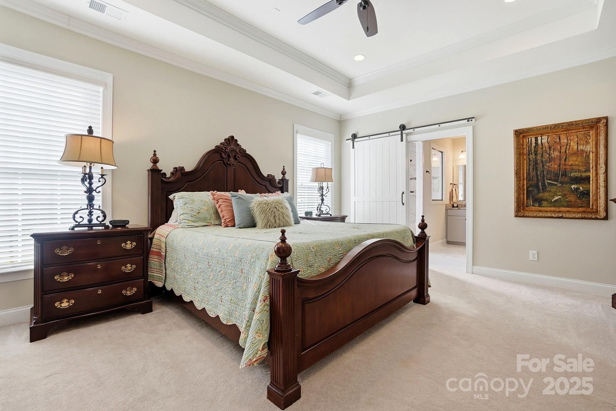 4069 Henshaw Road Waxhaw, NC 28173 - Photo 23 of 48 a bedroom with a bed and a lamp on dresser