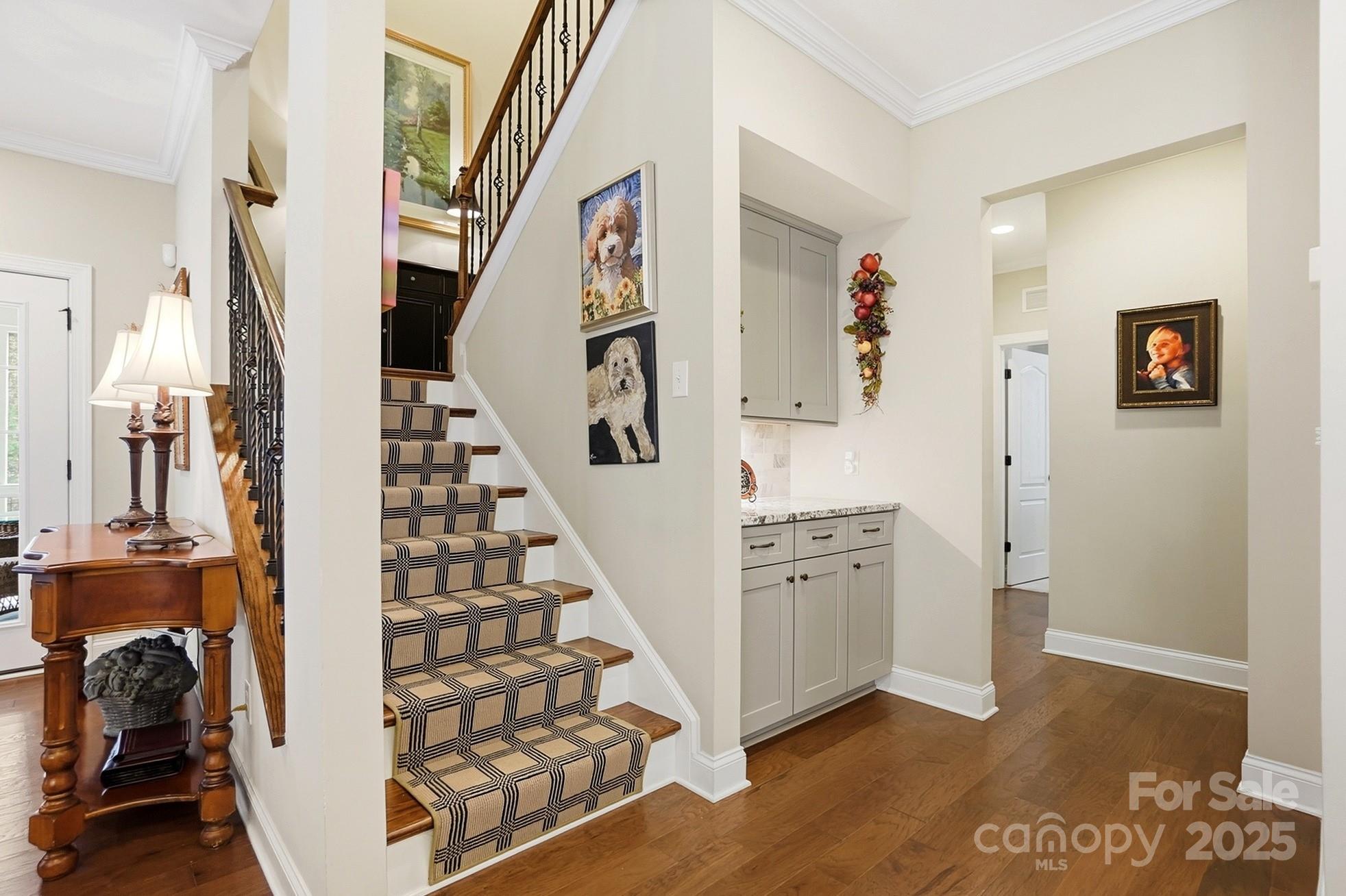 4069 Henshaw Road Waxhaw, NC 28173 - Photo 32 of 48 a view of a livingroom with wooden floor and stairs