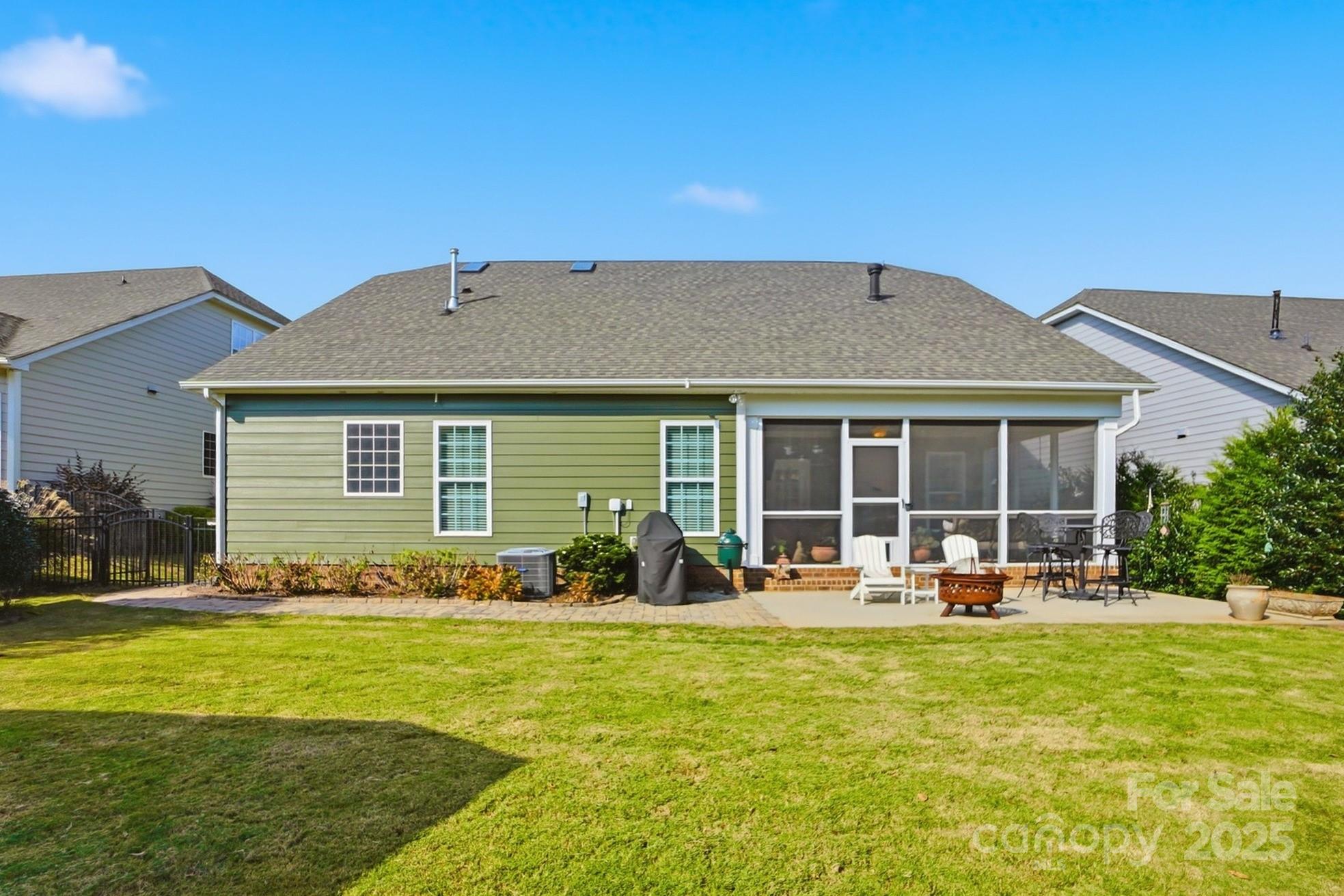 4069 Henshaw Road Waxhaw, NC 28173 - Photo 43 of 48 a front view of house with outdoor seating and yard