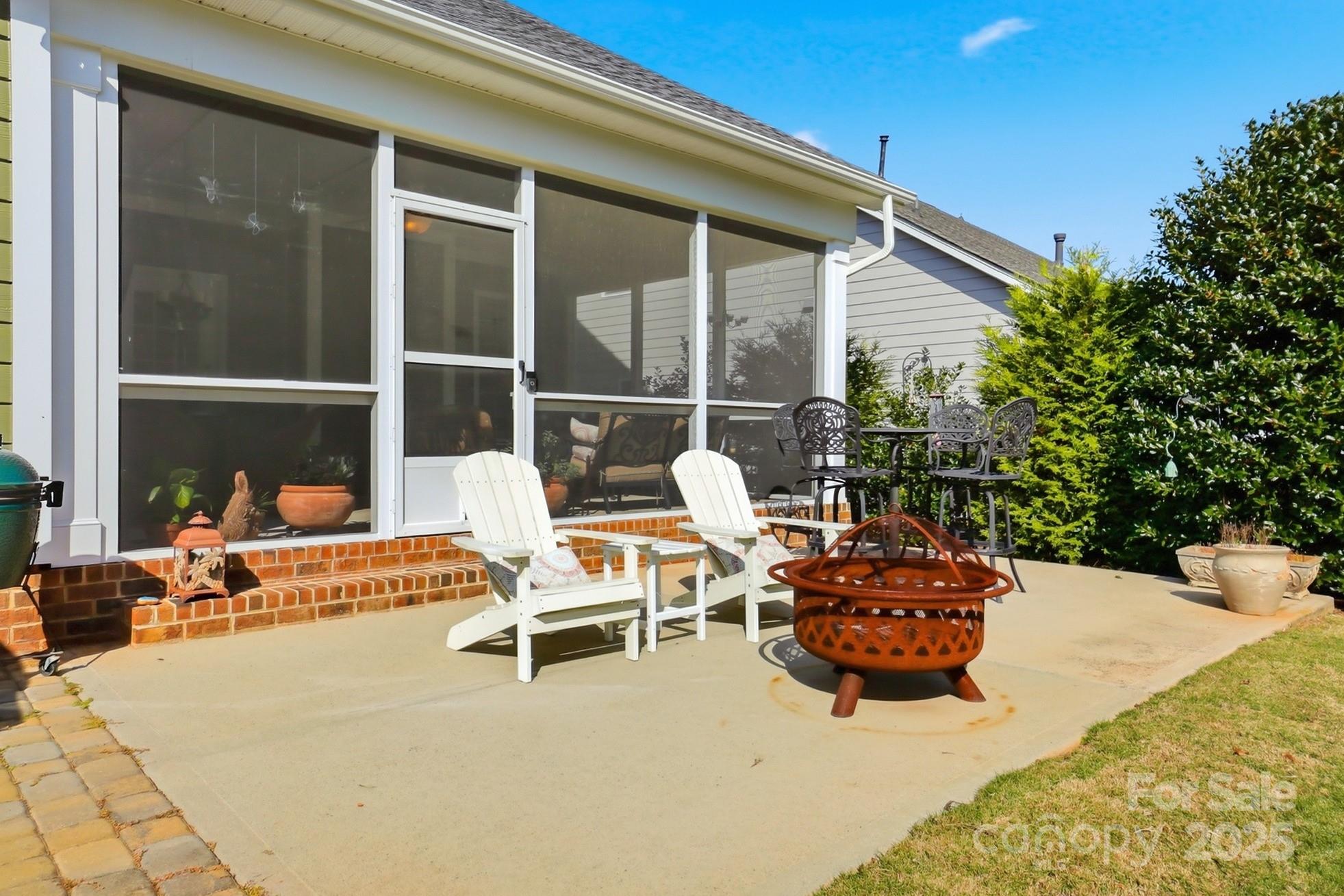 4069 Henshaw Road Waxhaw, NC 28173 - Photo 45 of 48 a outdoor space with patio furniture and potted plants