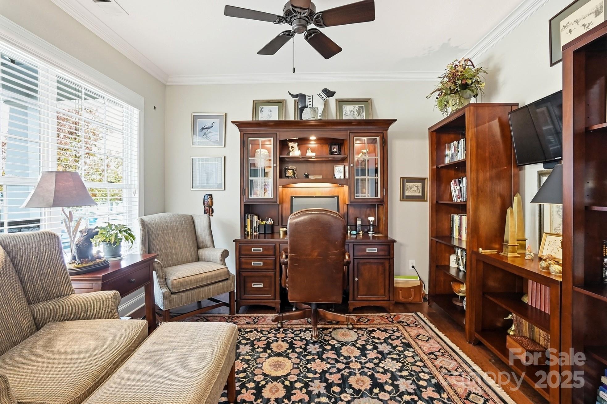 4069 Henshaw Road Waxhaw, NC 28173 - Photo 6 of 48 a living room with furniture a chandelier and a window