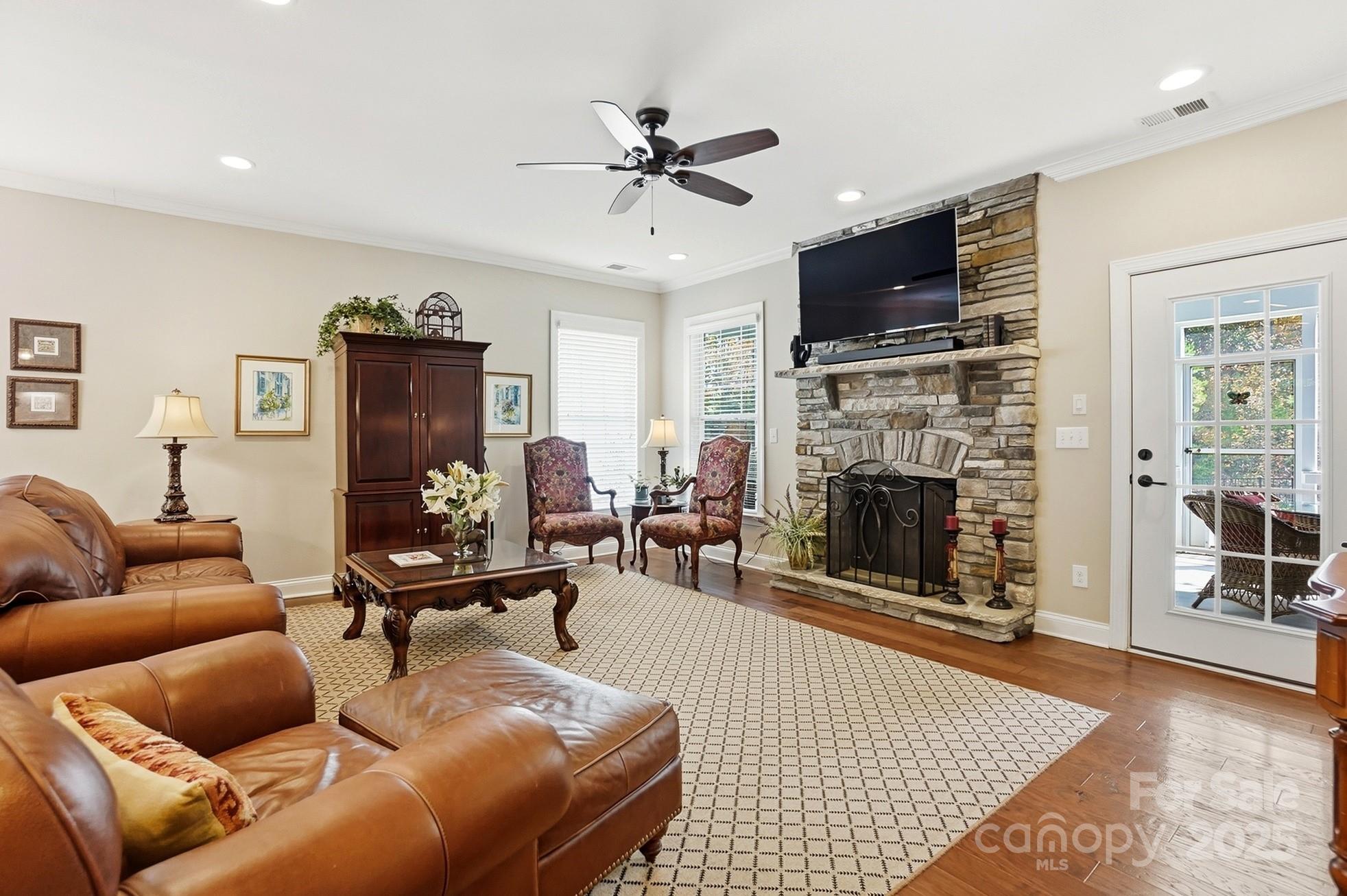 4069 Henshaw Road Waxhaw, NC 28173 - Photo 9 of 48 a living room with furniture and a fireplace