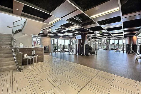 a view of a couches and table in the patio