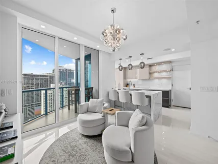 a view of a balcony with table and chairs