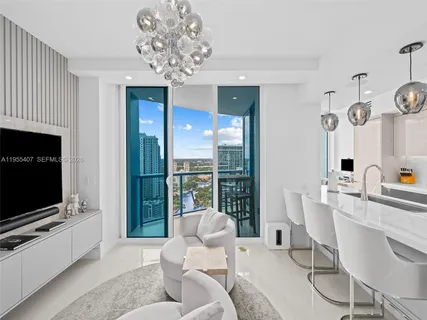 a view of a swimming pool with outdoor seating