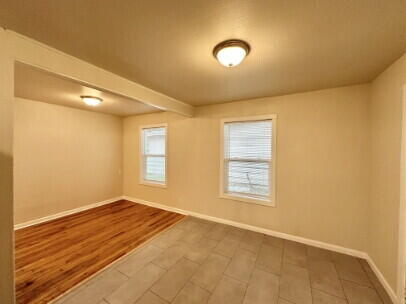 4214 37th Street Lubbock, TX 79413 - Photo 6 of 14 a view of an empty room and window