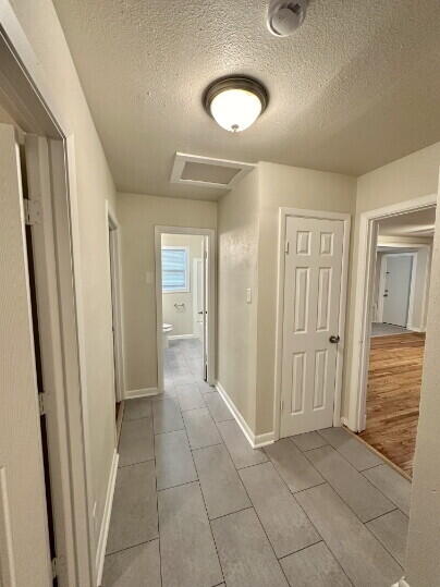4214 37th Street Lubbock, TX 79413 - Photo 10 of 14 a view of a hallway