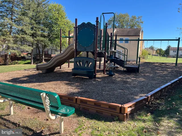 a view of a slide with a bench