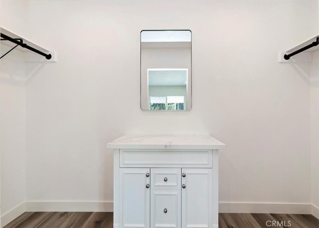 31130 South General Kearny Road, Unit 163 Temecula, CA 92591 - Photo 21 of 49 large walk in closet in primary bedroom