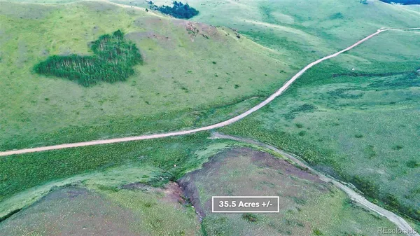 a view of a field with sign board