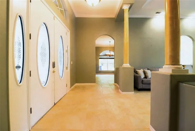 a spacious bathroom with a double vanity sink a large mirror and a bathtub