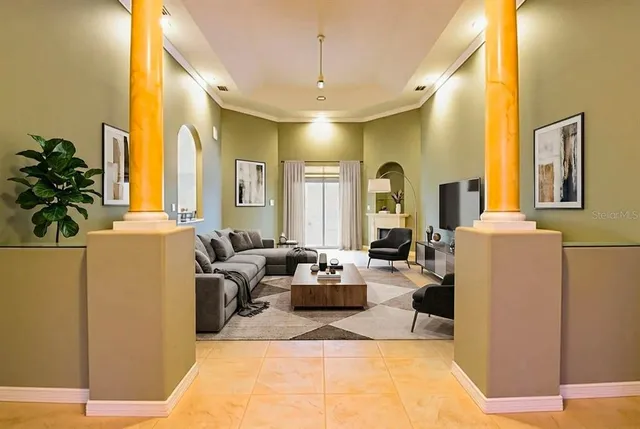 a kitchen with a table chairs stove and cabinets