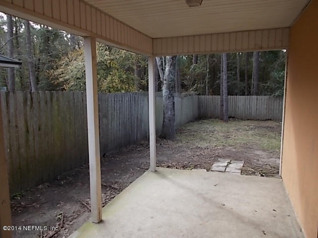938 Cherry Point Way Jacksonville, FL 32218 - Photo 29 of 34 a view of backyard with green space