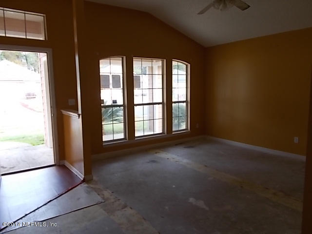 938 Cherry Point Way Jacksonville, FL 32218 - Photo 5 of 34 a view of empty room with floor to ceiling window