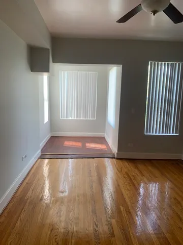 a view of livingroom with hardwood floor and window
