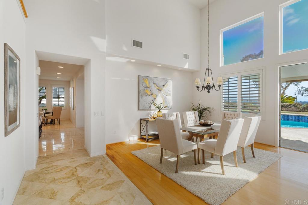 7357 Melodia Terrace Carlsbad, CA 92011 - Photo 17 of 60 a view of a dining room with furniture