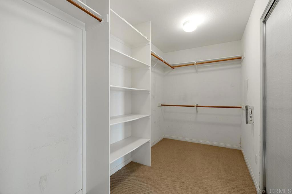 7357 Melodia Terrace Carlsbad, CA 92011 - Photo 42 of 60 a view of an empty walk in closet