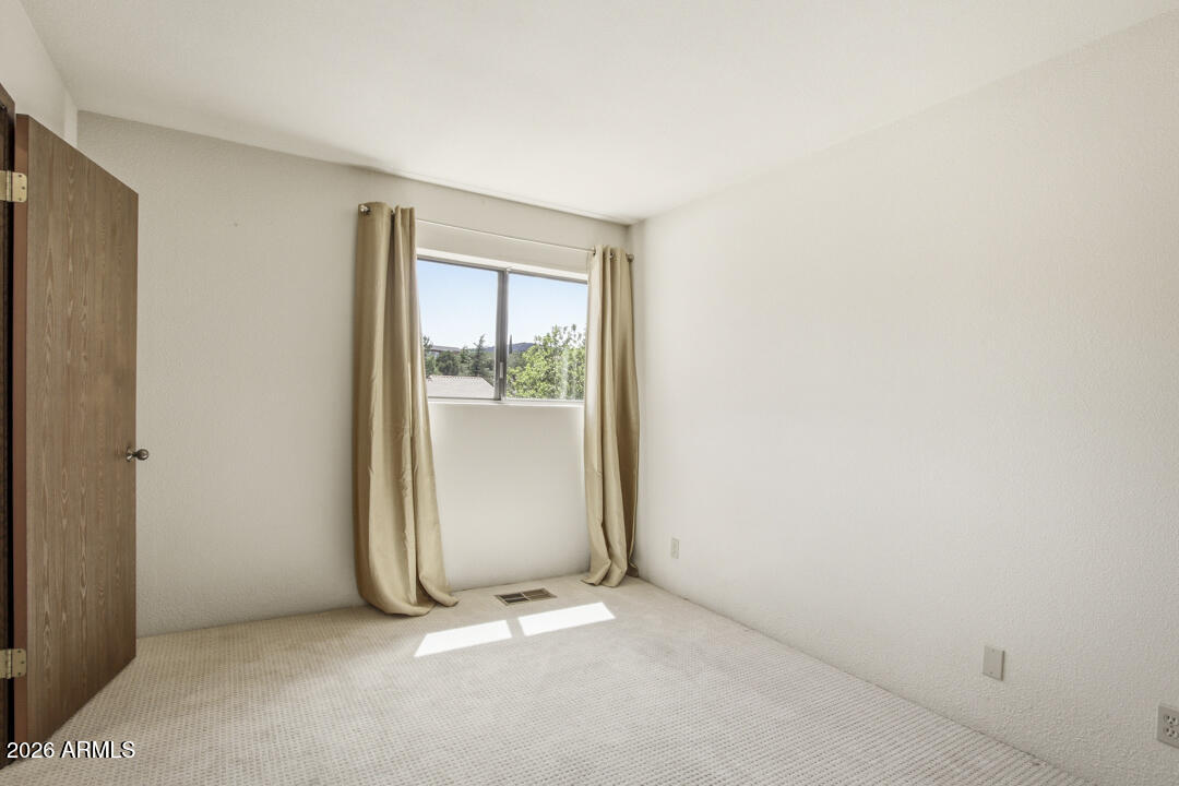 165 Verde Valley School Road, Unit 6 Sedona, AZ 86351 - Photo 24 of 40 an empty room with windows