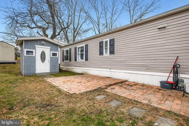 a house with trees in front of it