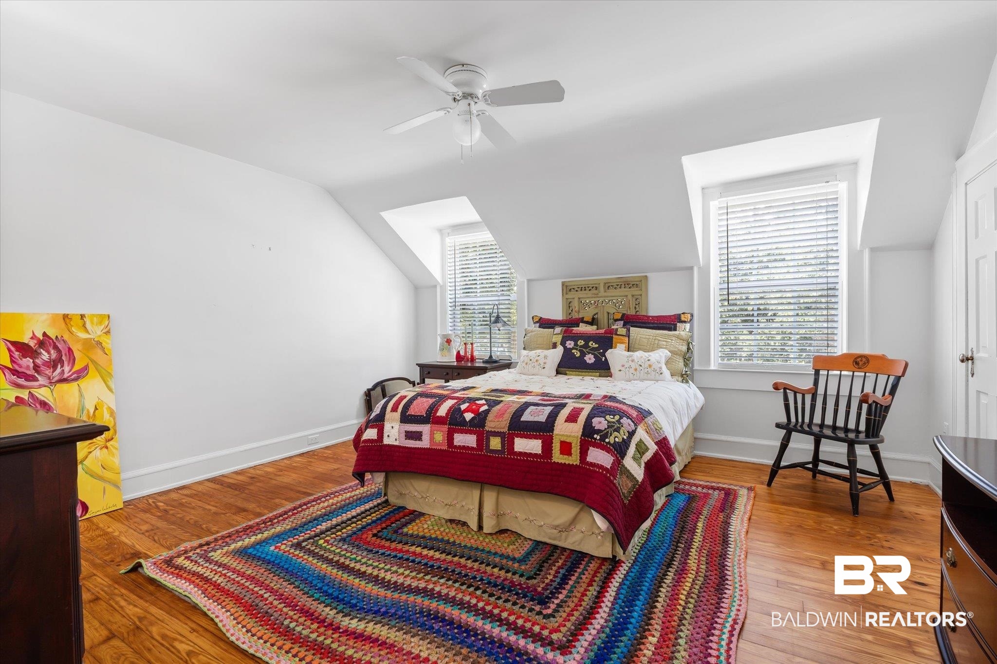 202 Woodlands Avenue Mobile, AL 36607 - Photo 31 of 53 Bedroom with lofted ceiling, multiple windows, wood-type flooring, and ceiling fan