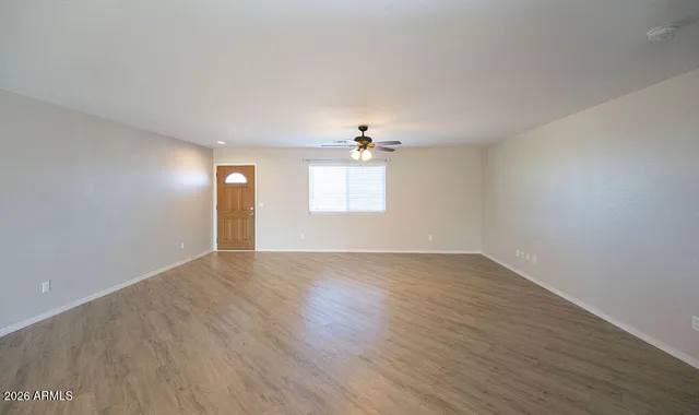 a view of a livingroom with wooden floor