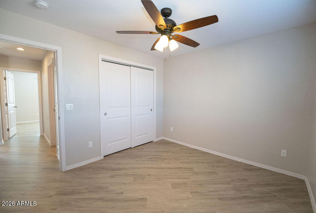 19643 East Rojo Road Florence, AZ 85132 - Photo 29 of 45 wooden floor in an empty room