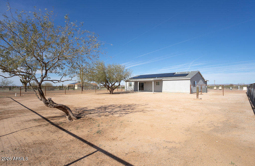 19643 East Rojo Road Florence, AZ 85132 - Photo 10 of 45 a front view of a house with a yard